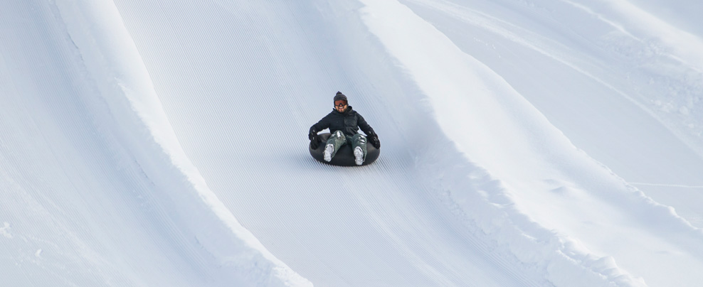 Go snow tubing to enjoy winter to the fullest in Quebec!