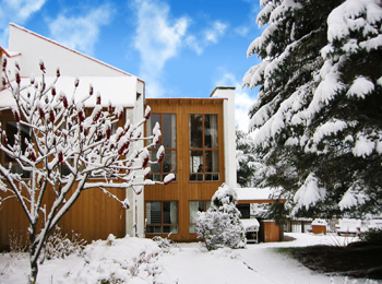 Exterior of Hotel Chéribourg under a blanket of snow