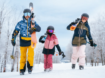 Young family out for a day of skiing