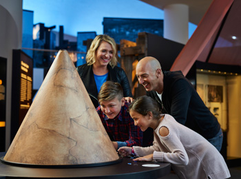Happy family discovering the museum