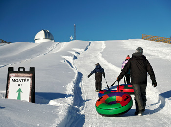 Snow tubing at Parc régional du Bois de Belle-Rivière