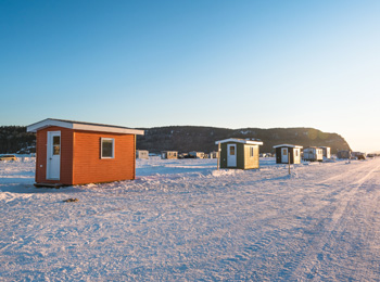 Fishing cabins on the ice on the Saguenay fjord