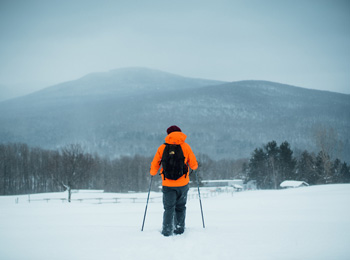 Hiker in the winter at Mont Sutton